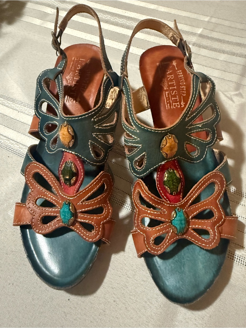 La Artiste Teal and Brown Leather Butterfly Sandals with Colorful Stone Accents